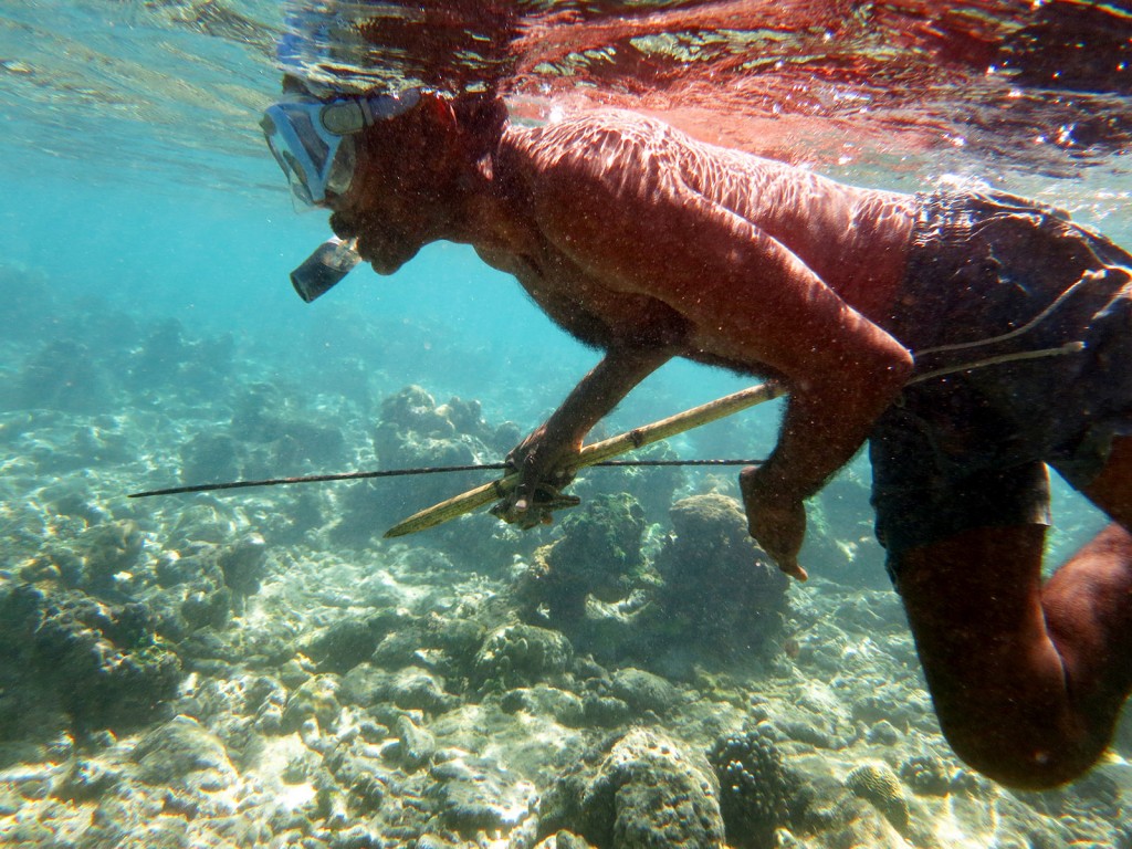 The king of Nosy Mitsio diving at a coral reef in search of octopus, to use for bait when line-fishing.